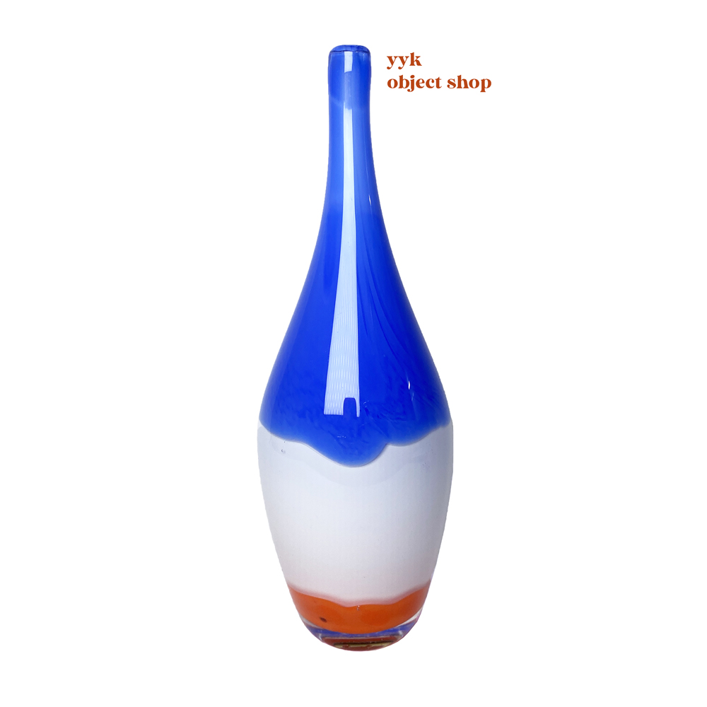 [Blue, White, Orange Bottle object]